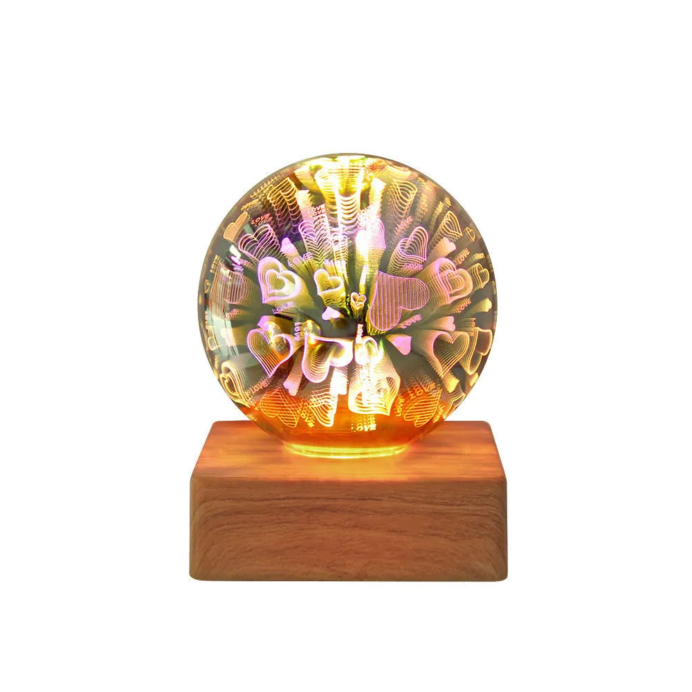 USB plug-in crystal ball LED night light showing fireworks design on a desk
