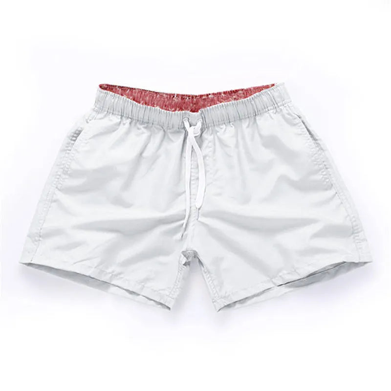Men's straight leg polyester beach shorts in multiple colours with extended sizing options