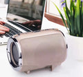 Portable metal subwoofer speaker with USB port and button controls in black, blue, golden, red, or silver.
