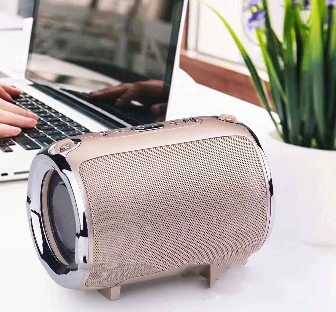 Portable metal subwoofer speaker with USB port and button controls in black, blue, golden, red, or silver.