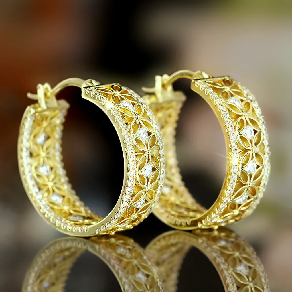 Geometric butterfly clip earrings with horse eye flower detail in yellow gold tone