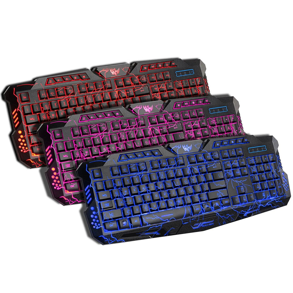 Black backlit game keyboard with crack design, 3-colour adjustable backlight, and anti-slip pads on a desk