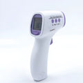 White digital non-contact thermometer with infrared sensor and display