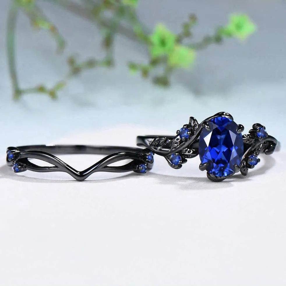 Women's gun black geometric ring with navy blue rhinestone decoration on copper base