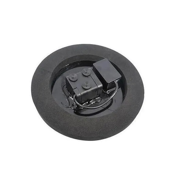 Black solar-powered fountain pump with multiple nozzles on a small pond or bird bath.