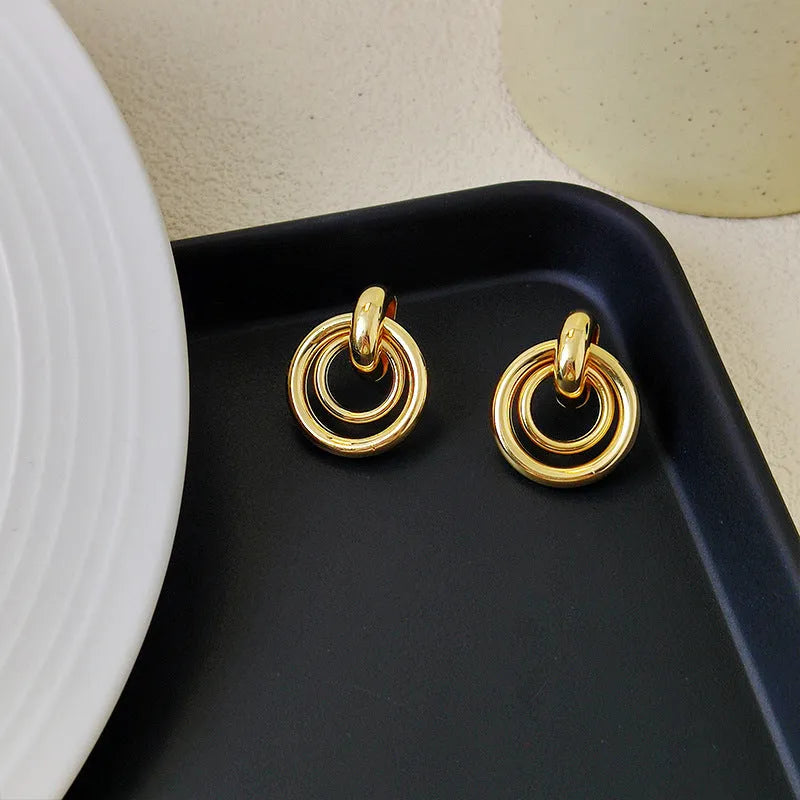 Simple geometric round ring earrings for women in gold or silver electroplated finish mixed material