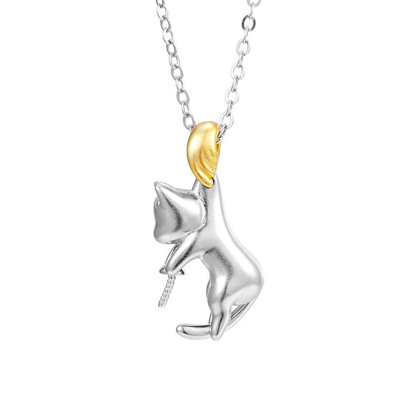 Sterling silver clavicle-length necklace with a cat charm pendant.