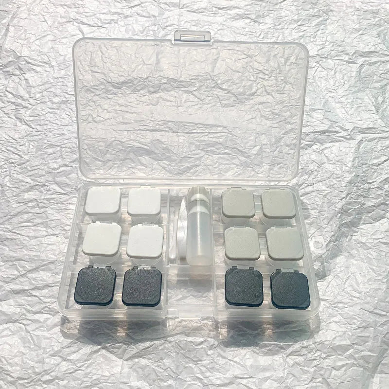 Rectangular contact lens case in various colour combinations including black white and pink white