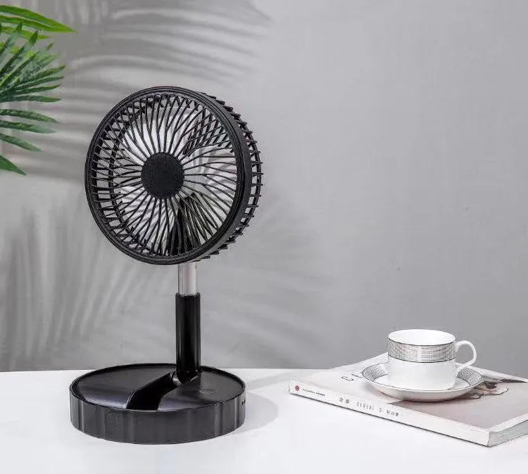 Black portable telescopic folding fan extended to full height showing oscillation function and power bank port