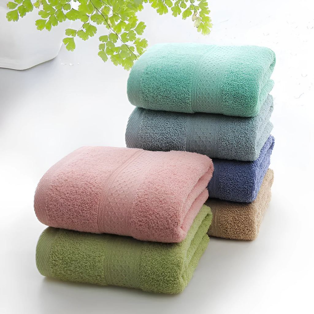 Thickened cotton blend bath beach towel showing colour options including green, blue, brown, and pink
