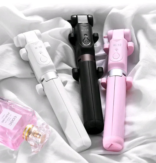 Aluminium Bluetooth selfie stick with tripod base and remote control extended with mobile phone attached