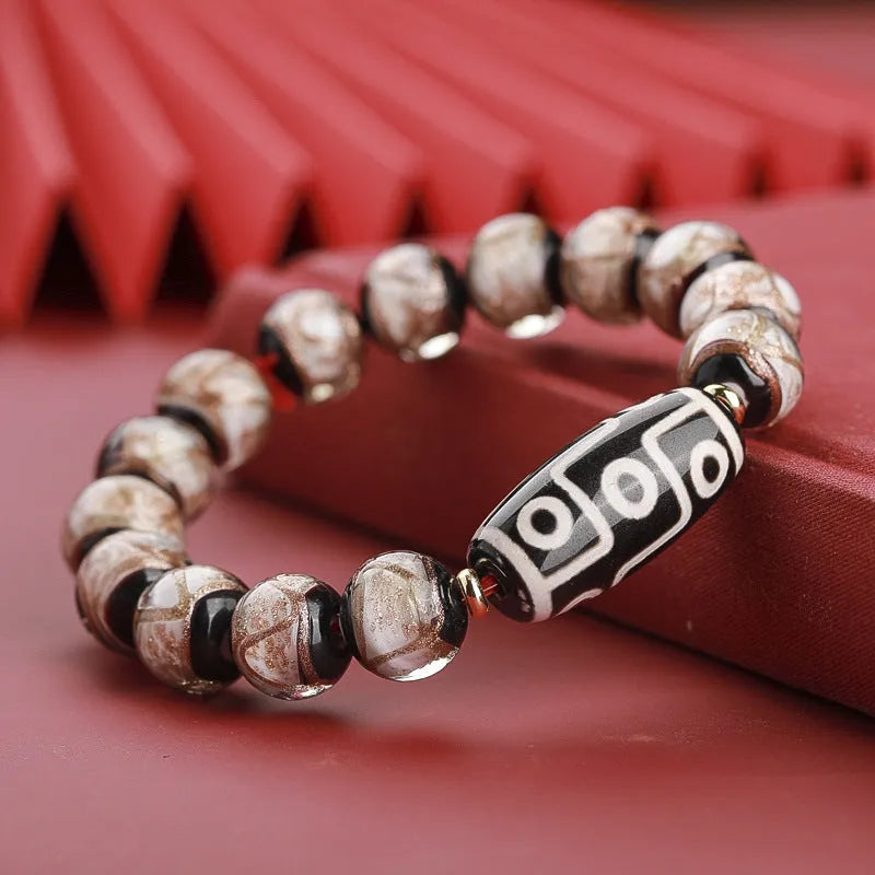 Chinese-style five-colour glaze bracelet with snake motifs and manual beadwork.
