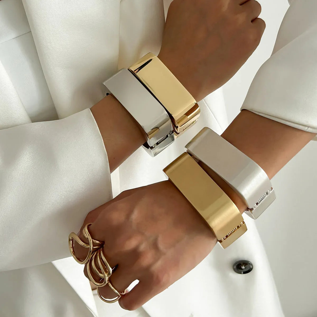 Geometric square mirror bracelet with glossy electroplated alloy finish in Gold or Silver Sweep colour