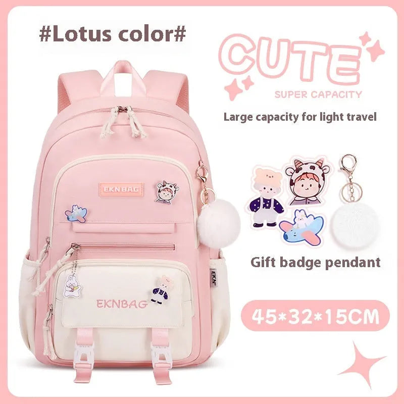 Pink waterproof Oxford cloth school backpack for girls with curved shoulder straps.