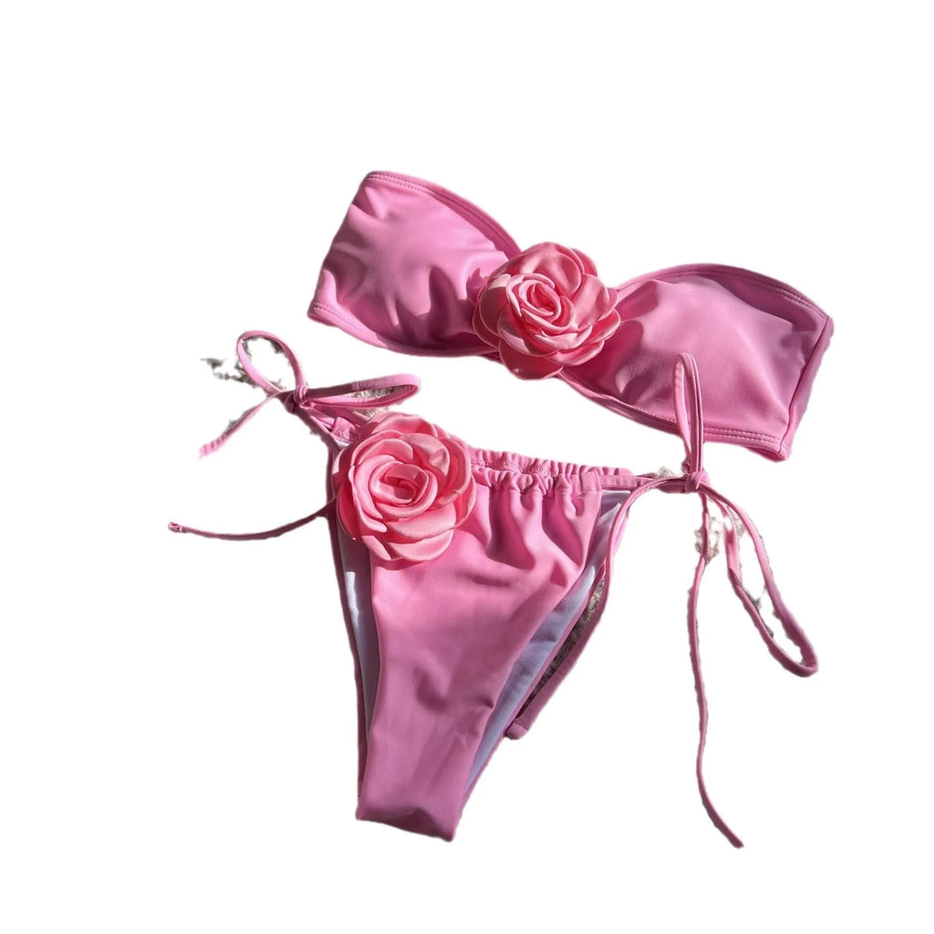 Women's solid colour tube top swimsuit with drawstring strap in rose red on a mannequin
