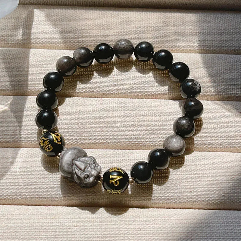 Men's silverstone bracelet with beadwork featuring Chinese proverbs, on a wrist.