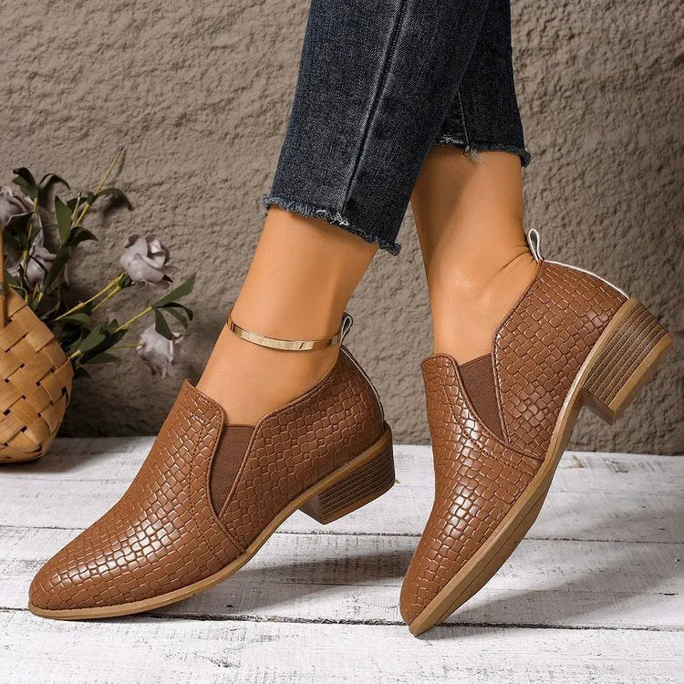 Women's pointed toe high cut pumps in brown with chunky mid heel and PU upper