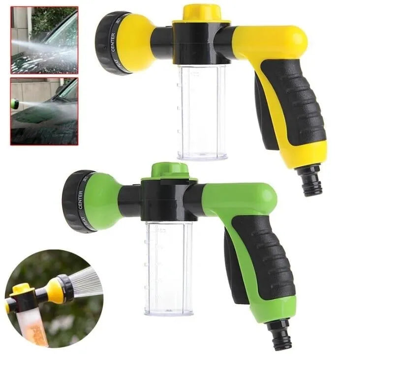 Green high-pressure foam spray gun for car washing with adjustable nozzle and attached water pipe.