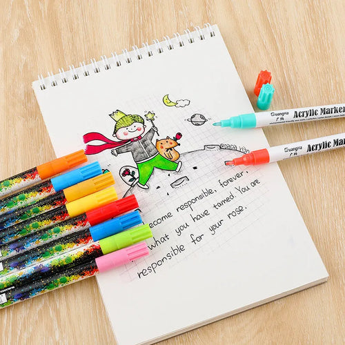 Set of six colourful acrylic graffiti marker pens with 0.7mm tips in a plastic box.