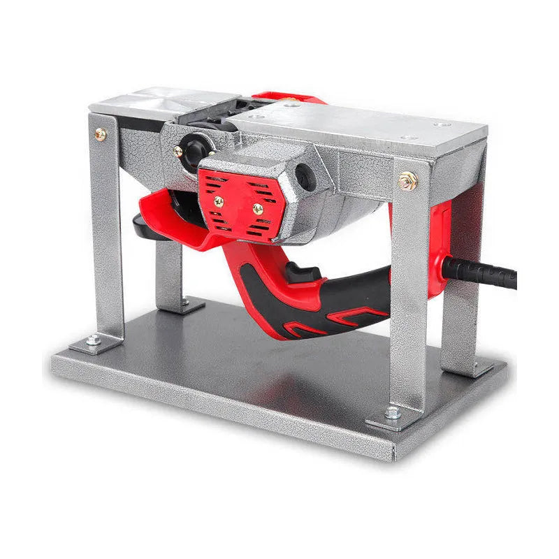 Black iron flip chip bracket for portable electric planer on a workbench.