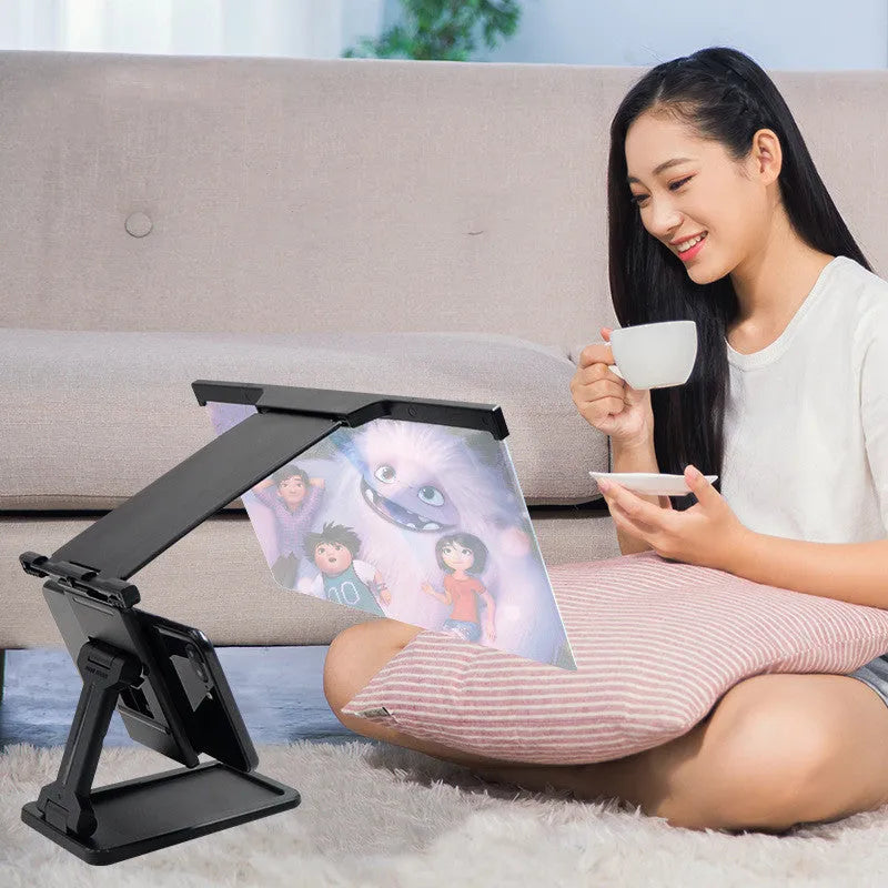 L20 black mobile phone screen magnifier showing 12-inch acrylic lens and separate ABS plastic phone bracket.