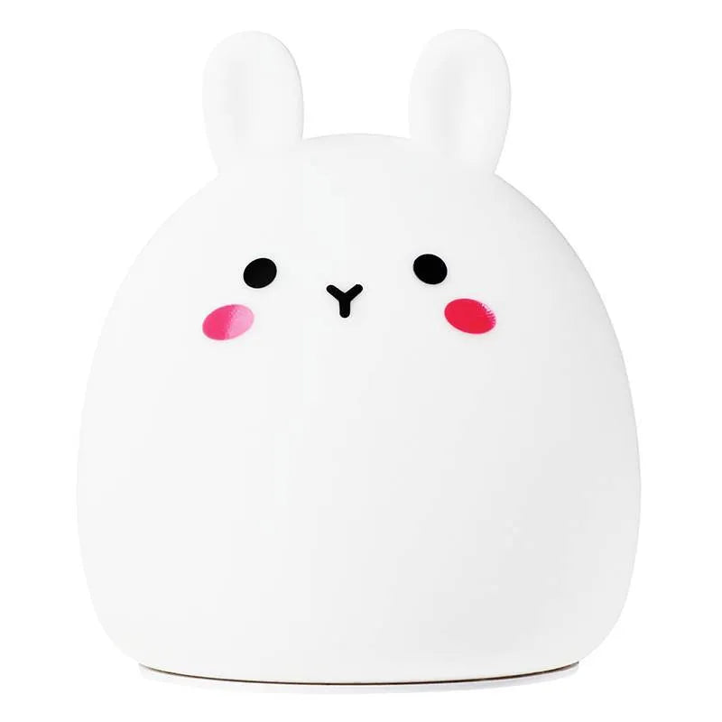Silicone cute rabbit rechargeable night light with LED glow on bedside table