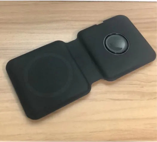 White foldable magnetic wireless charging dock showing dual-device support and adjustable angle.