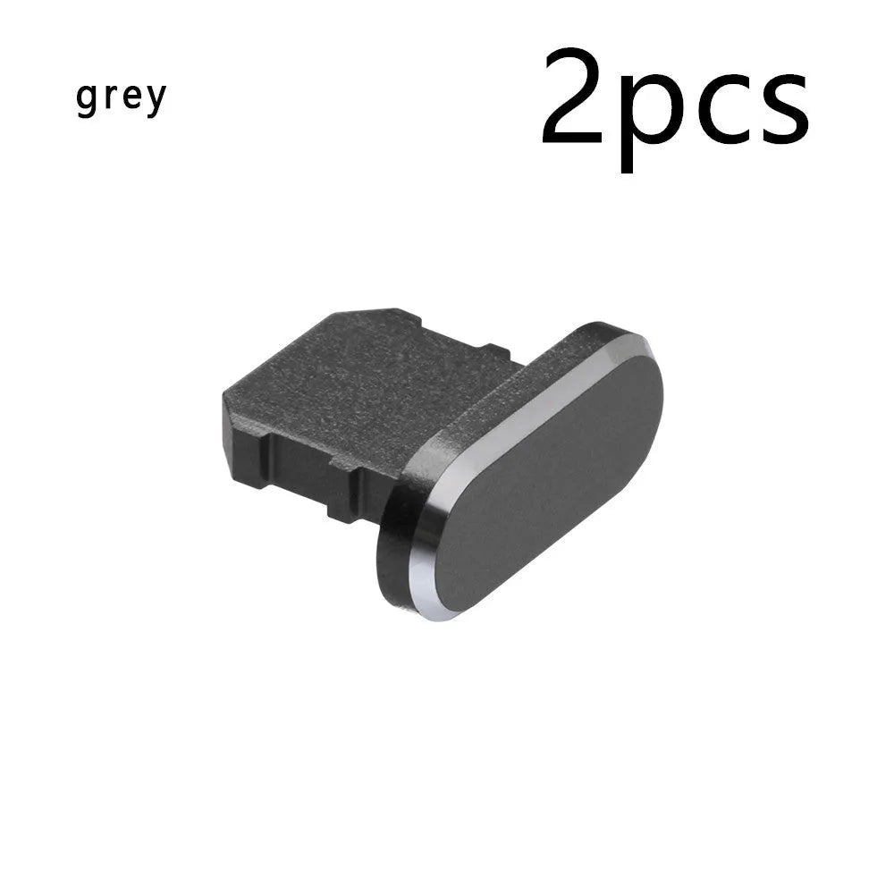 Aluminium alloy charging port dust plug for iPhone in various colours including gold, silver, blue, and black.