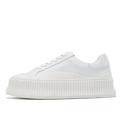 Women's black suede platform sneakers with thick 4cm sole and back lacing.