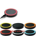 A compact square wireless charging base for mobile phones, shown in multiple colour options.