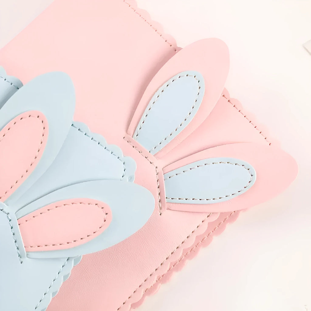 3-inch rabbit mini photo album with PU cover showing pink, blue and white colour options