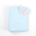 3-inch rabbit mini photo album with PU cover showing pink, blue and white colour options