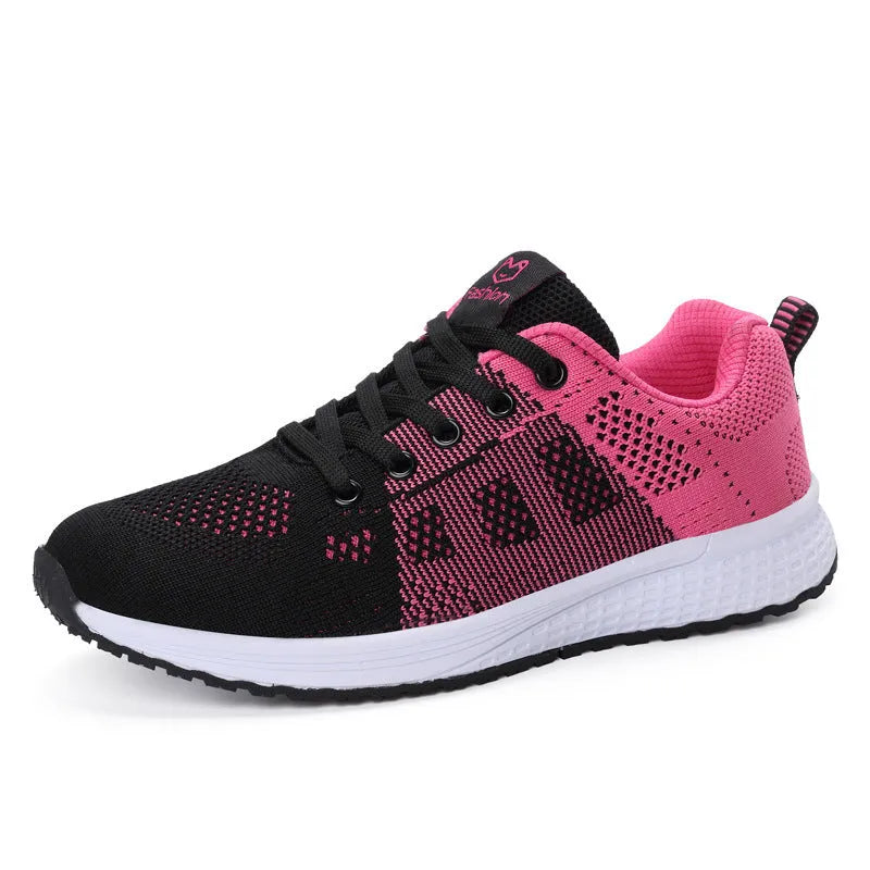 Women's flat casual shoe in white with high-top design and back lacing.