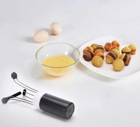 White and black automatic kitchen food stirrer with stainless steel whisk on countertop.