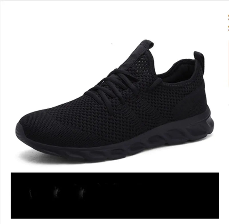 Men's black and white mesh sneakers with lace-up closure and PVC sole