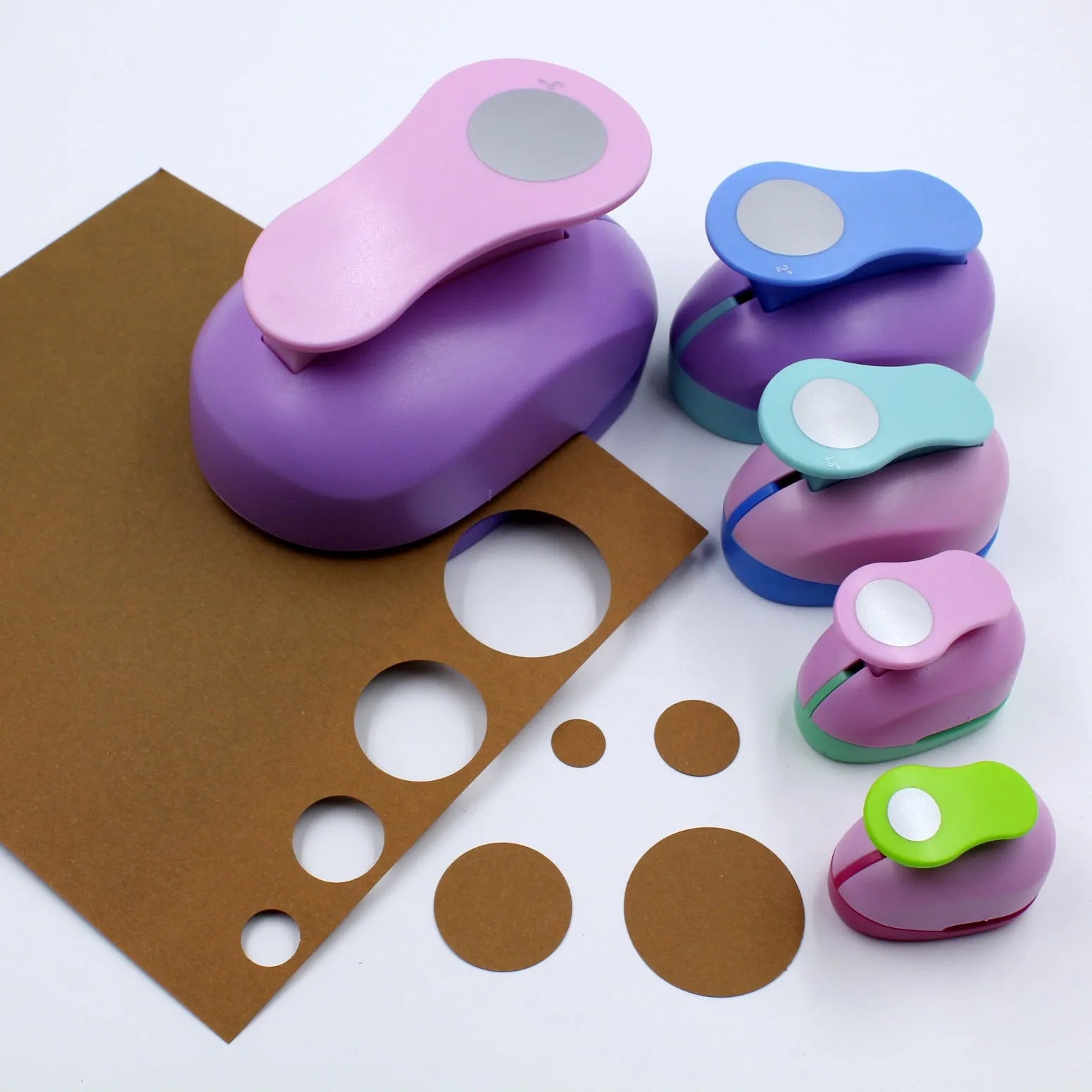 Colourful children's round embossing machine tool with ABS plastic and zinc alloy construction.