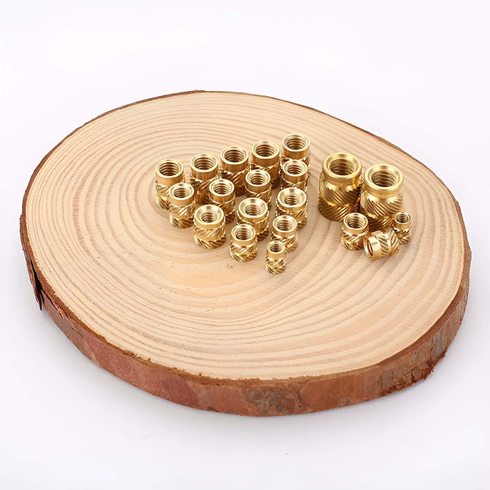 Brass hot melt copper nuts with M2 and M3 threads in various heights on a white background.