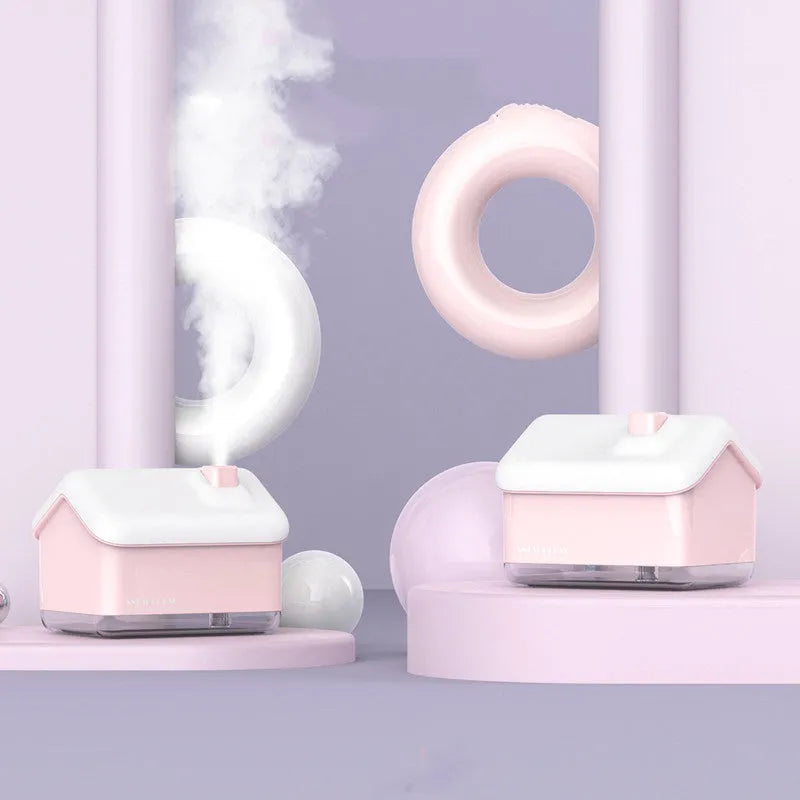 White igloo-shaped ultrasonic humidifier and essential oil diffuser with LED light and water tank.