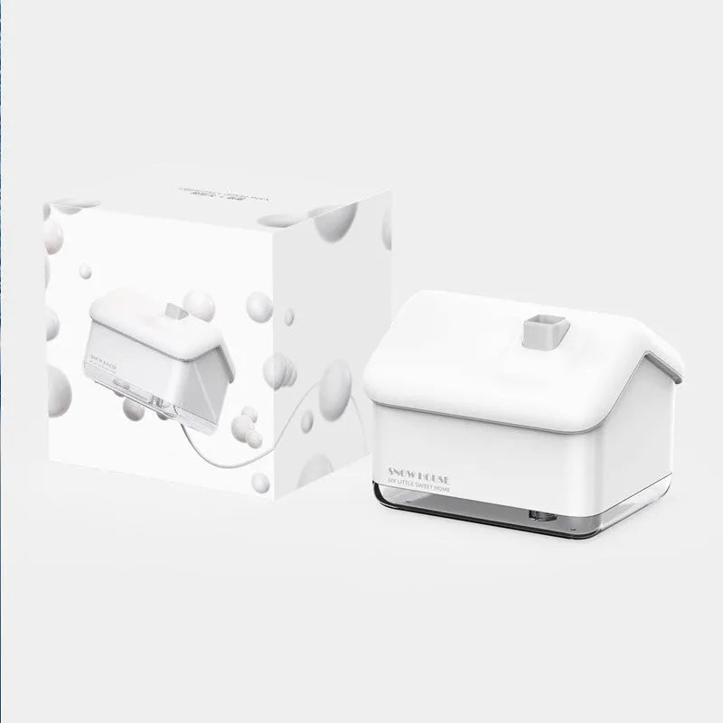 White igloo-shaped ultrasonic humidifier and essential oil diffuser with LED light and water tank.