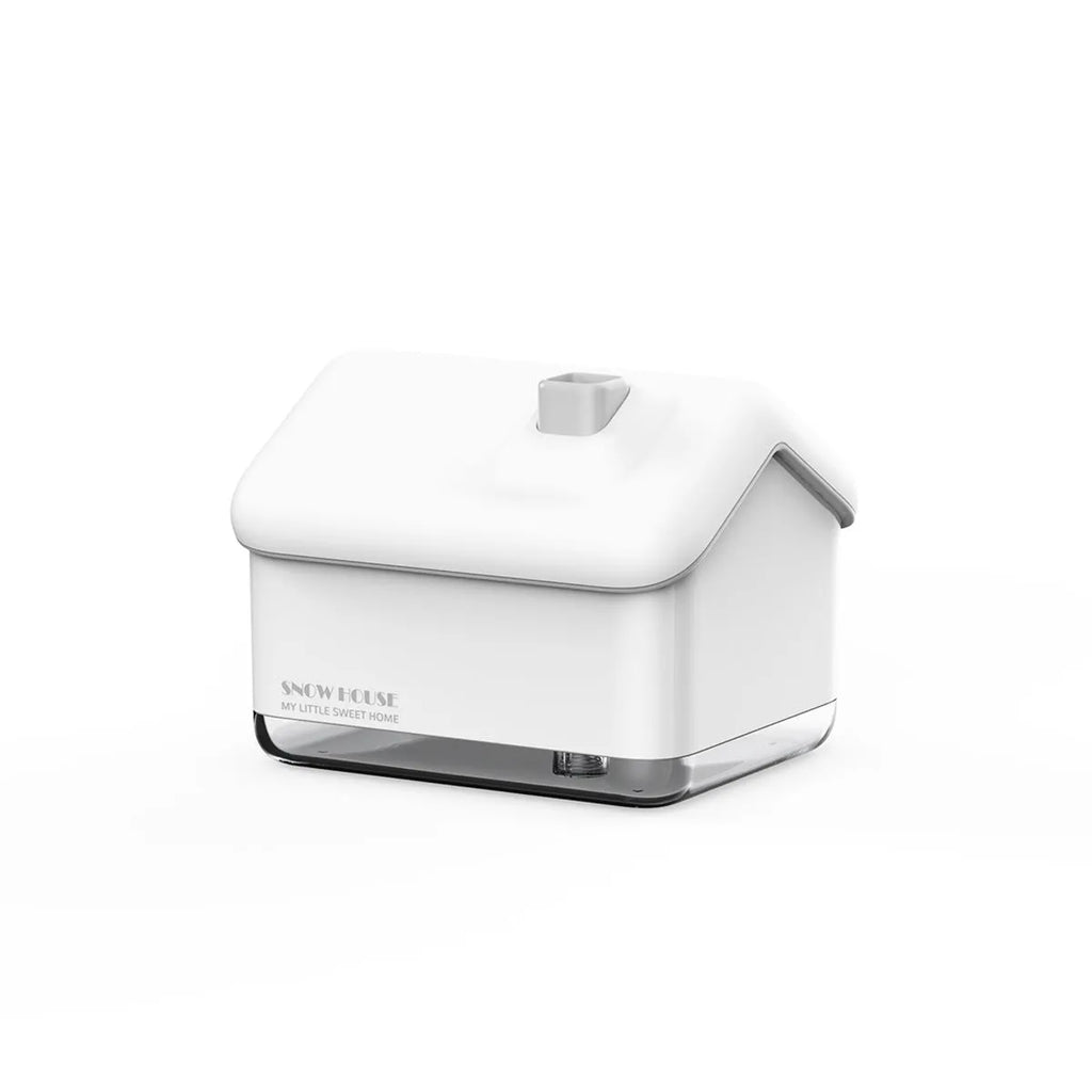 White igloo-shaped ultrasonic humidifier and essential oil diffuser with LED light and water tank.