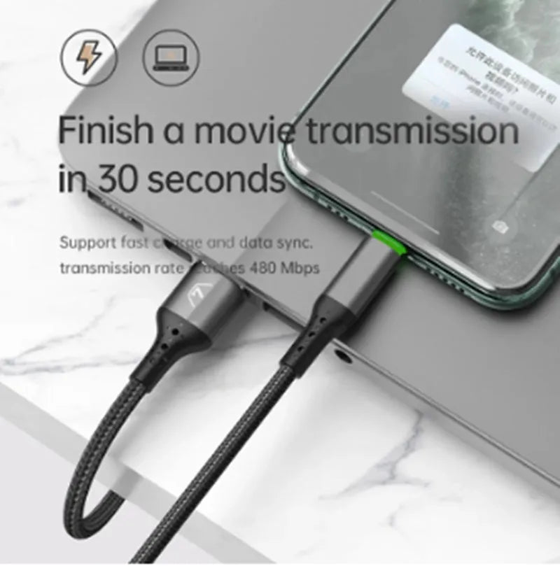Black braided MFi certified Lightning cable with LED indicator showing orange charging light