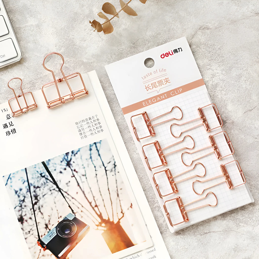 Rose gold metal binder clip set showing eight small and six large clips for document organisation