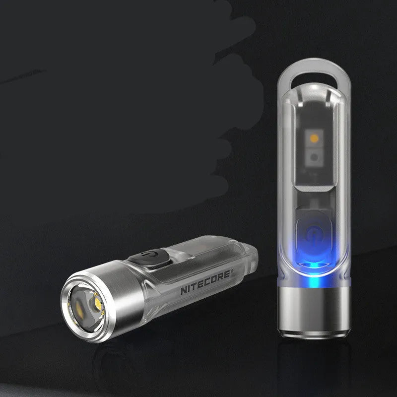 Green Nitecore TIKI USB rechargeable keychain light with three light sources: main LED, high CRI white and UV