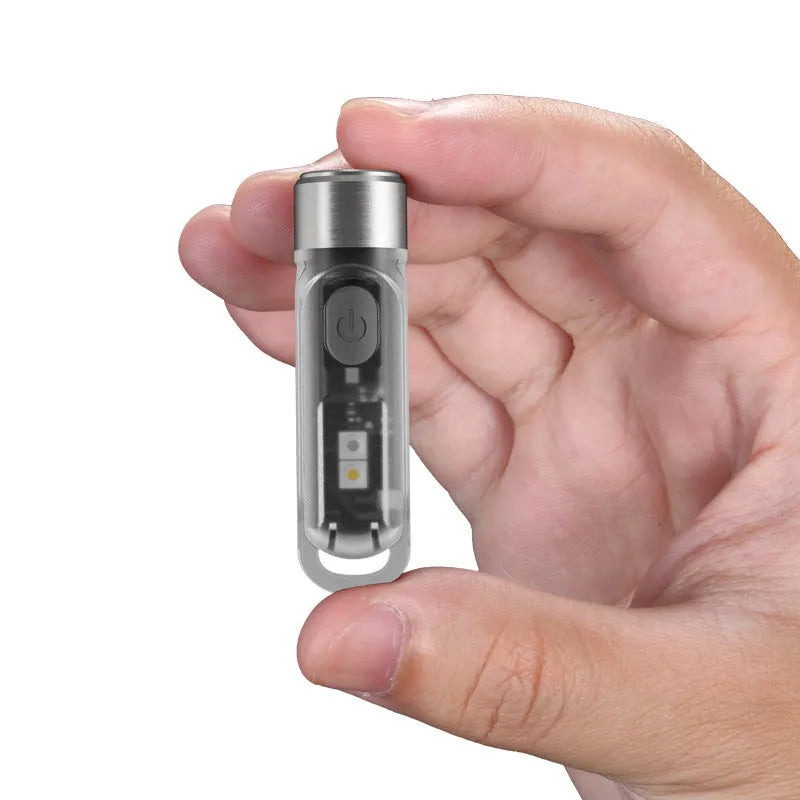 Green Nitecore TIKI USB rechargeable keychain light with three light sources: main LED, high CRI white and UV