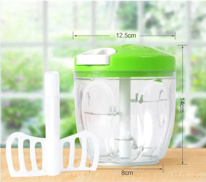 Green manual kitchen chopper grinder with three blades inside a clear bowl.