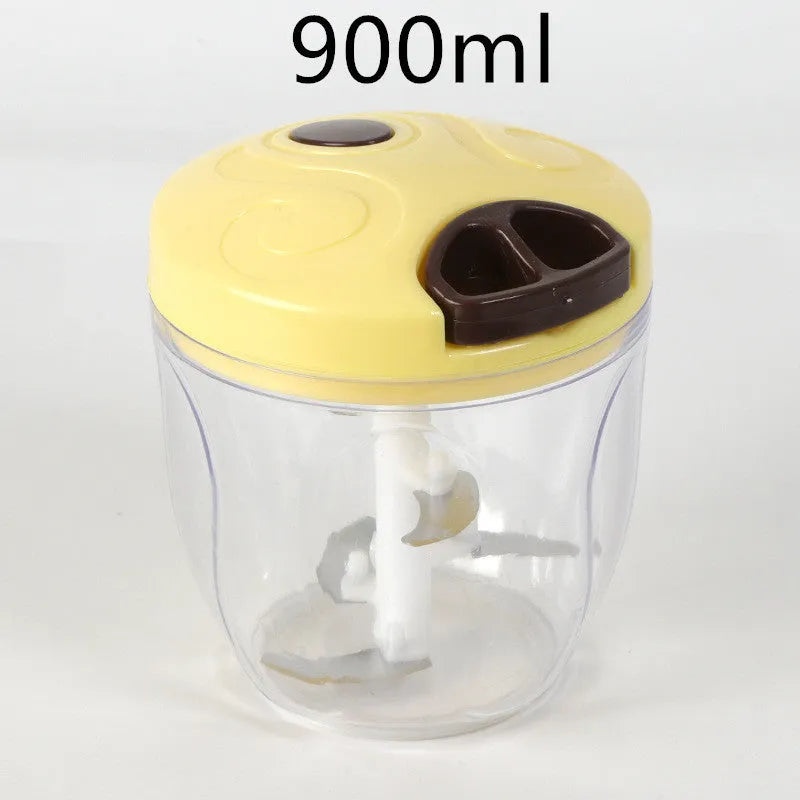 Green manual kitchen chopper grinder with three blades inside a clear bowl.