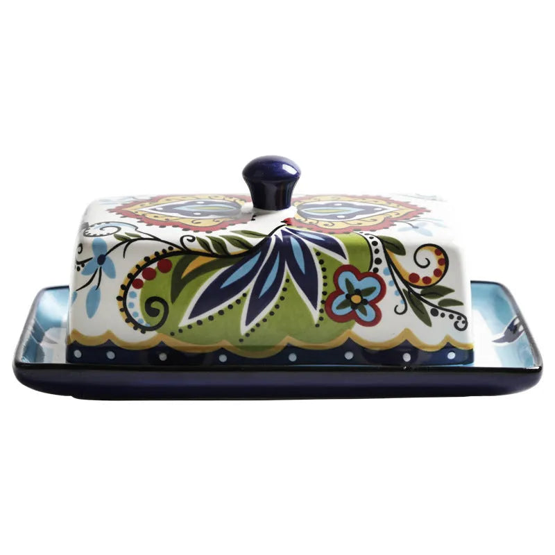 Ceramic butter box with lid showing floral pattern decoration in square European style design