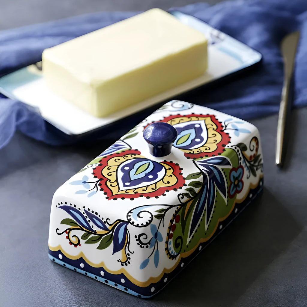 Ceramic butter box with lid showing floral pattern decoration in square European style design