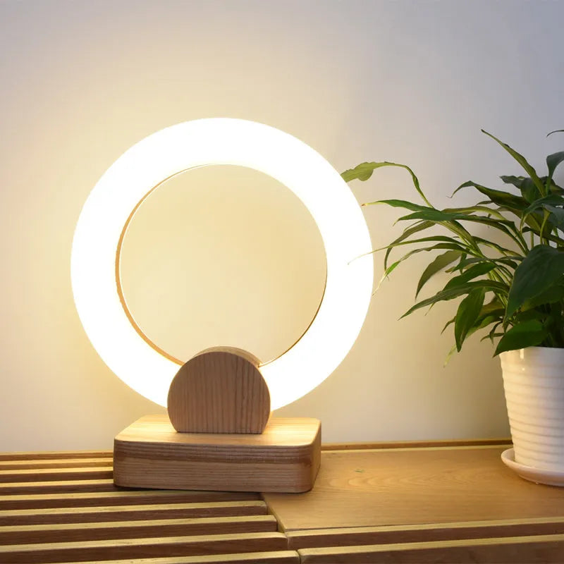 Nordic style wooden circular chandelier with acrylic shade in living room setting