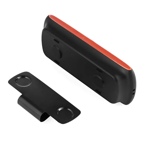 Orange Bluetooth car hands-free phone kit mounted on vehicle sun visor for wireless calling